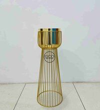 Gold plated planter with golden powder coated stands for interior garden decorations