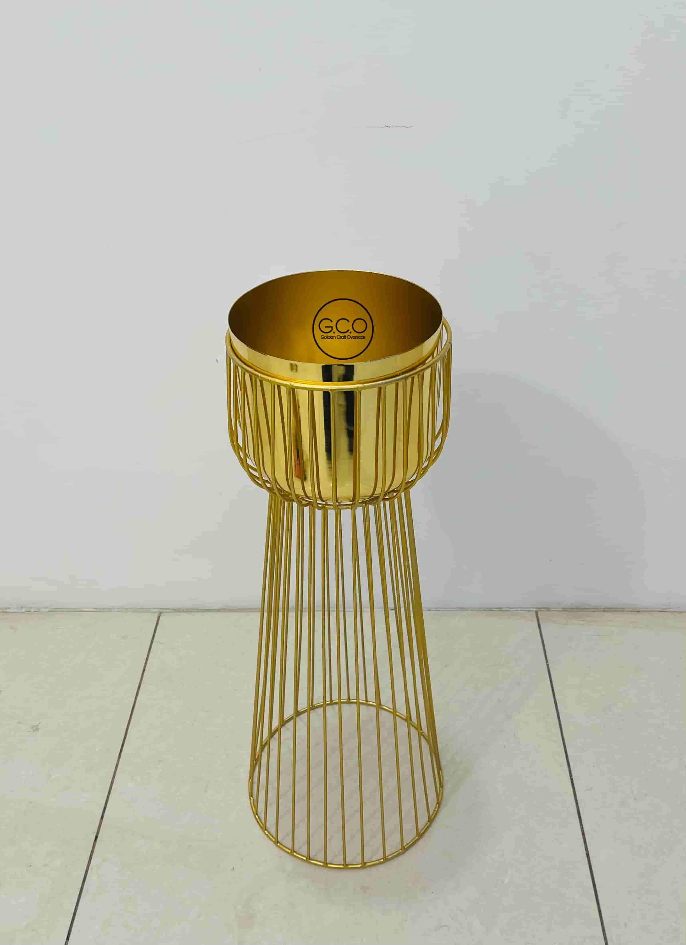 Gold plated planter with golden powder coated stands for interior garden decorations
