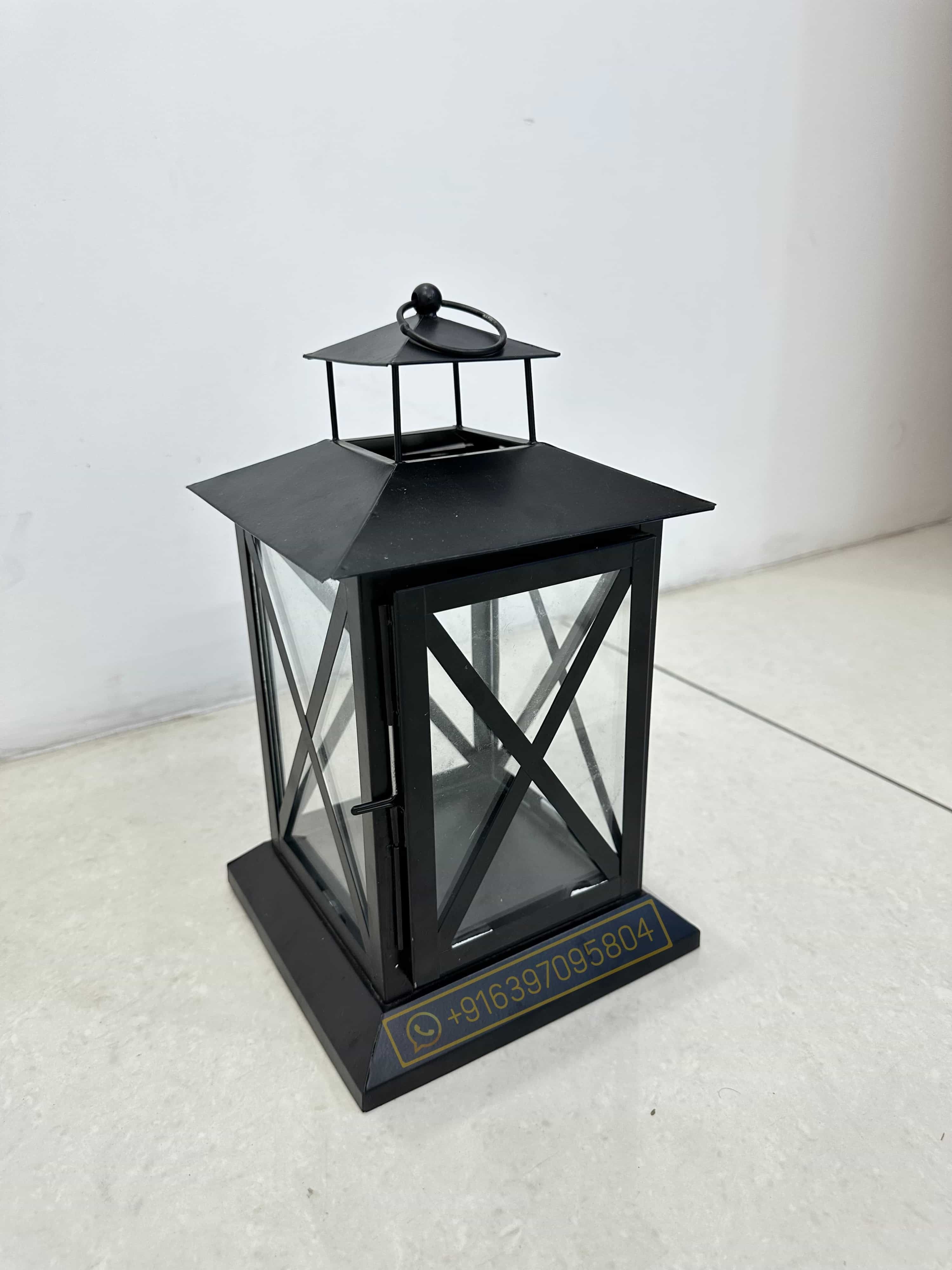 Black casual lantern in iron with matte black powder coated finish for hanging and table decorations