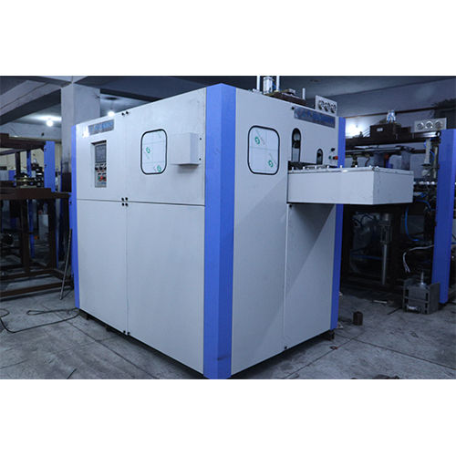 Man Feed Four Cavity PET Blow Moulding Machine