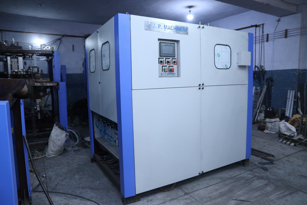 Man Feed Pet Stretch Blow Moulding Machine - Color: White/Blue