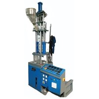 Vertical Clamping And Injection Moulding Machine