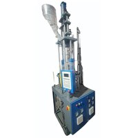 Vertical Clamping And Injection Moulding Machine