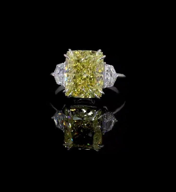 Cushion Fancy Vivid Yellow diamond ring