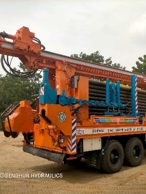 Water well drilling rig compressor and drillrods for single vehicle