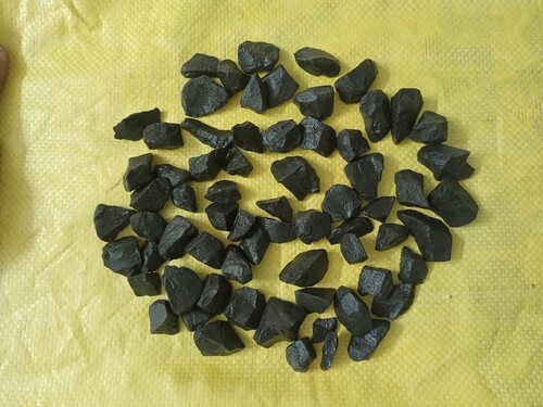 Jet black marble chips and decorative landscaping stone aggregate with resin coating polished