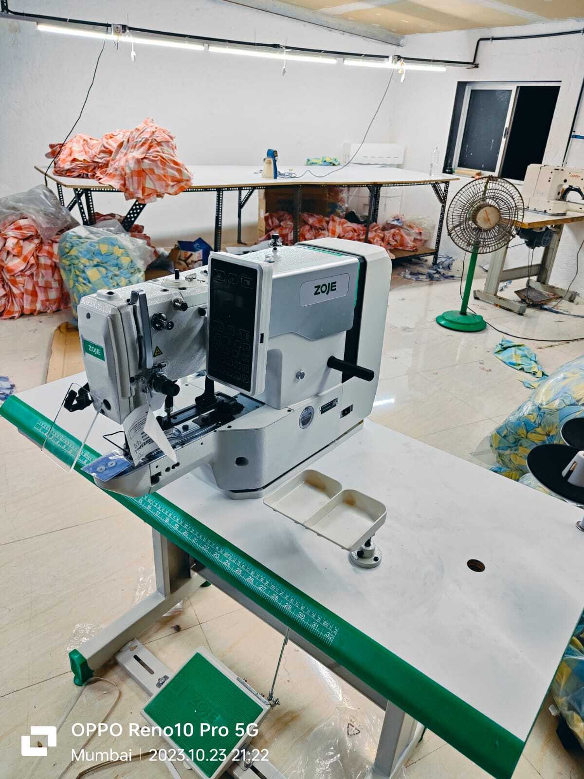 Electronic Button Attaching Sewing Machine