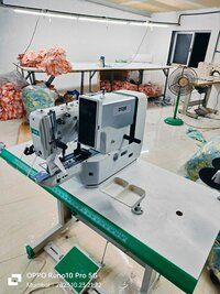 Electronic Button Attaching Sewing Machine