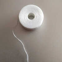White Polyester Embroidery Bobbin Thread - 25m Length, 70gm Weight | Light In Weight, Fancy Yarn, Dyed Pattern