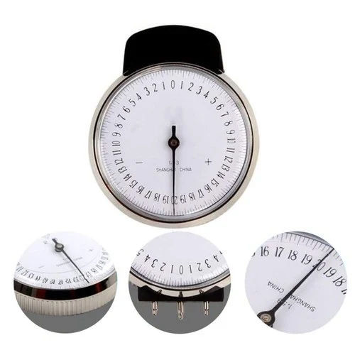 White And Black Ophthalmic Lens Measure Clock