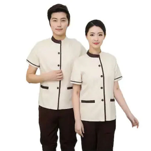 Cream And Brown Hotel Staff Uniforms