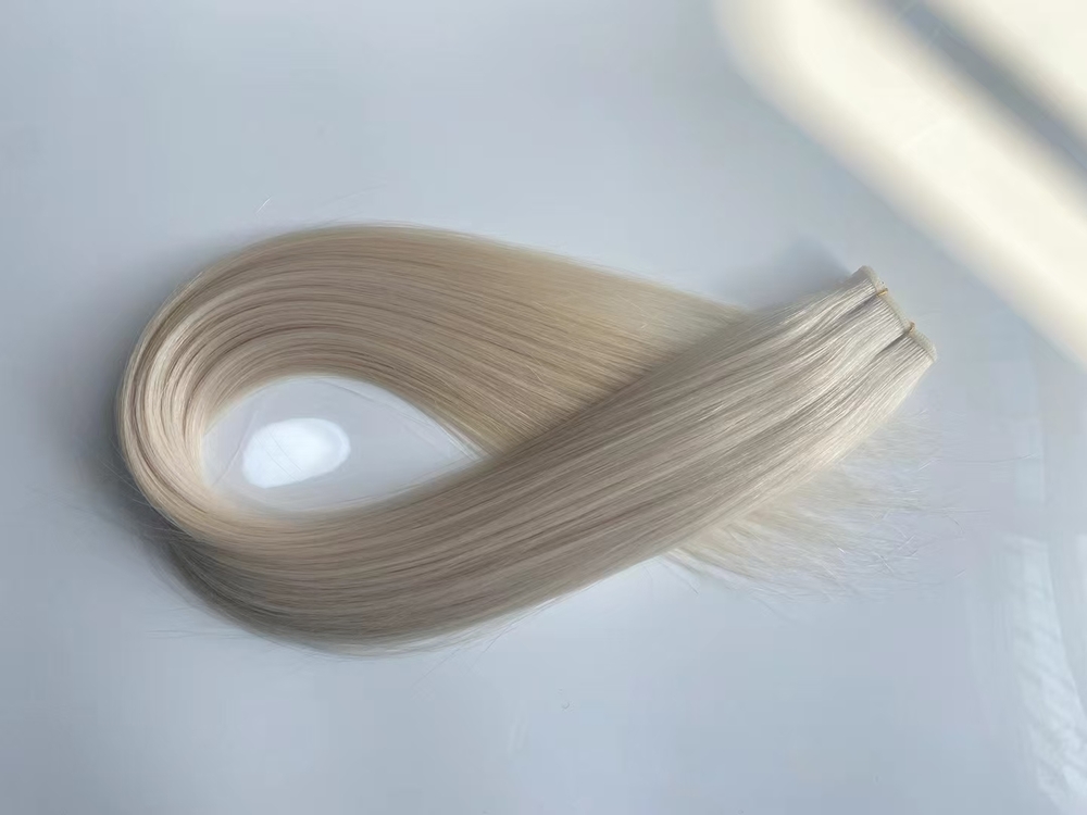 White hand-tied weft hair extensions