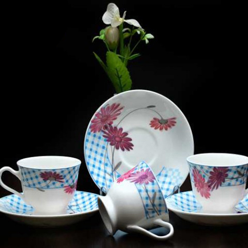 CERAMIC WHITE CUP AND SAUCER