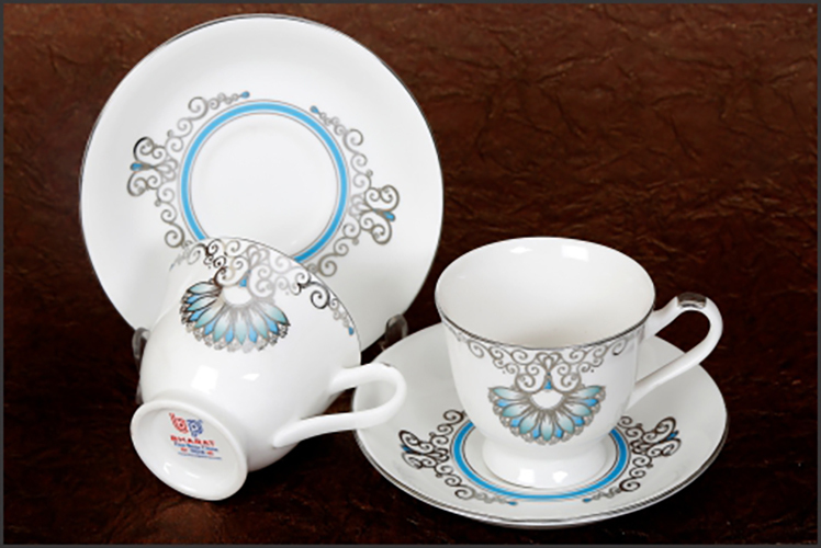 CERAMIC CUP SAUCER ( WHITE BROWN PRINT)