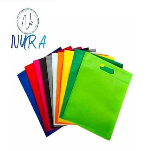 9/12 D Cut Carry Bag Multi Colour Handle Material: Non Woven Fabric