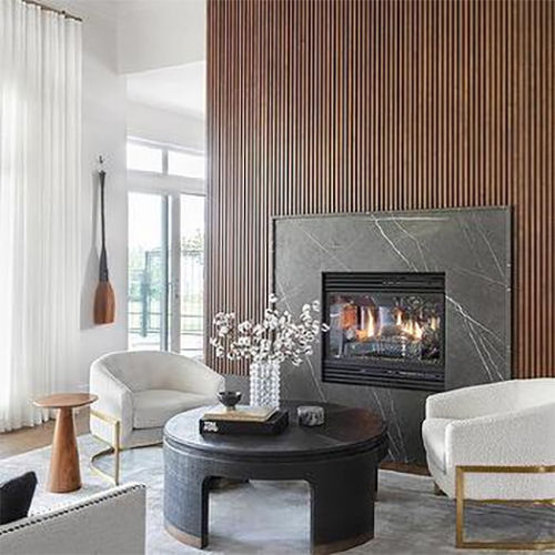 Brown Reeded Fireplace Wall With Black Marble