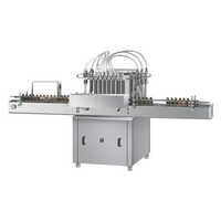 Fully Automatic Volumetric Liquid Filling Machine - Stainless Steel & Mild Steel 220V | High Efficiency PLC Control Electric Drive Sleek Silver Design Warranty Included