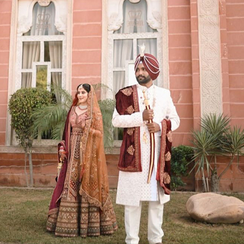 Bridal Couple Lehnga And Groom Sherwani