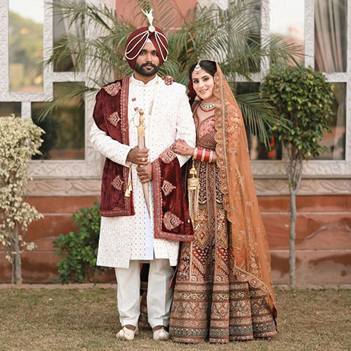 Multicolor Bridal Lehnga And Groom Sherwani