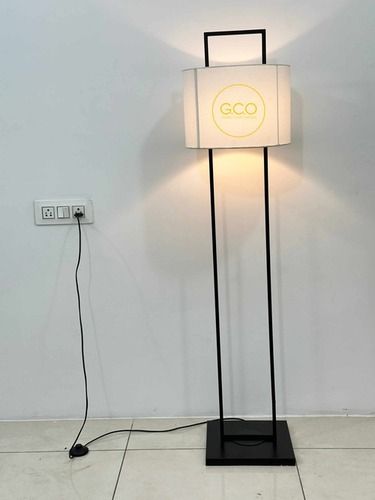 Metal Floor Lamp with white fabric shade and black frame for interior decorations