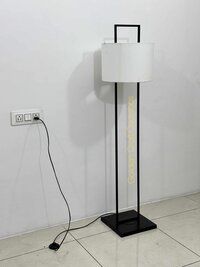 Metal Floor Lamp with white fabric shade and black frame for interior decorations