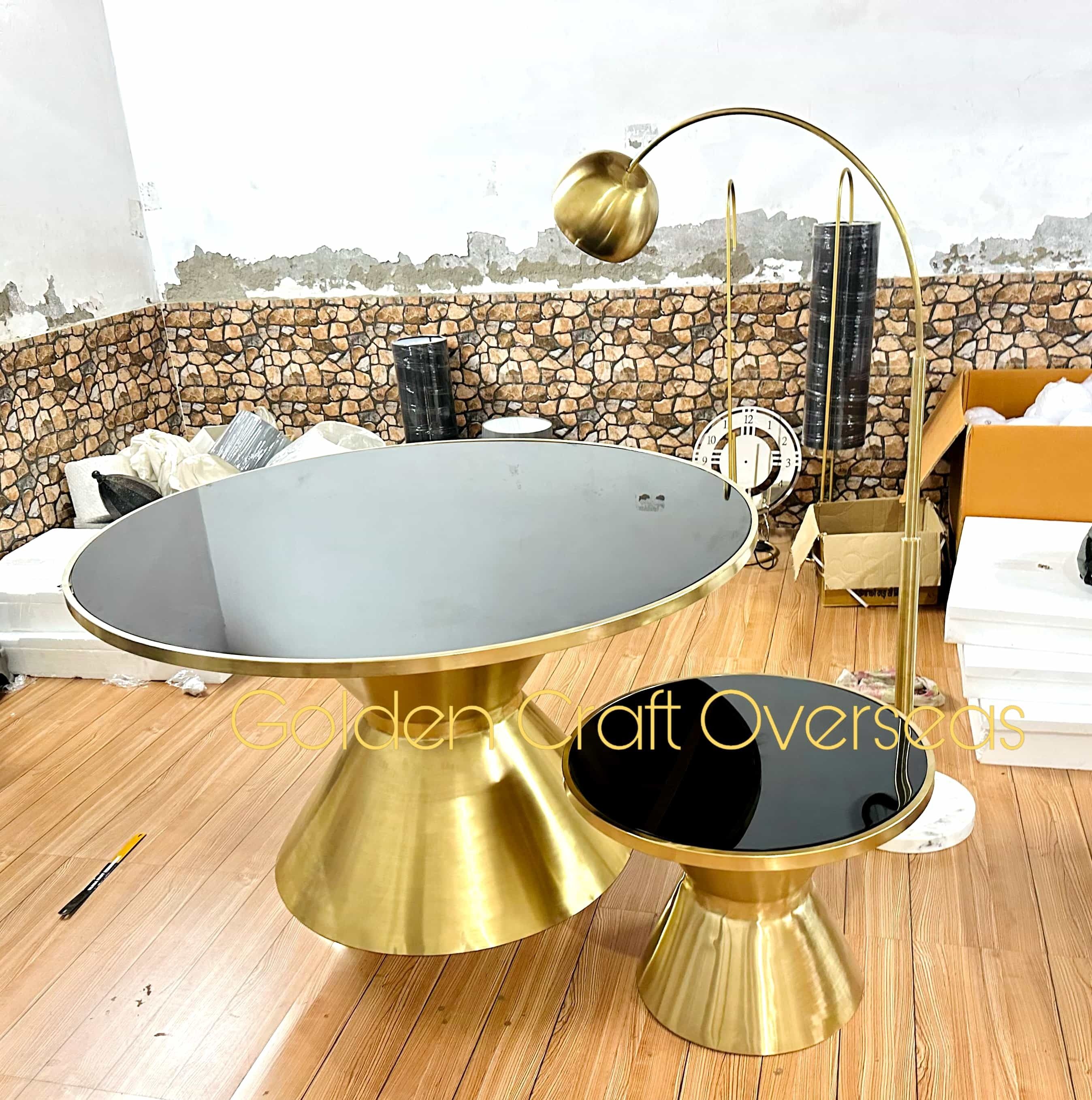 Stainless Steel Round Dining table in 304 PVD Gold Finish with Black toughened glass top