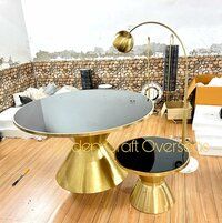 Stainless Steel Round Dining table in 304 PVD Gold Finish with Black toughened glass top