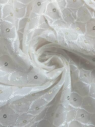Viscose thread embroidered fabric for your designer garments online