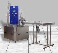 Rotary curd filling machine