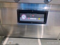 Double chamber vacuum sealer machine