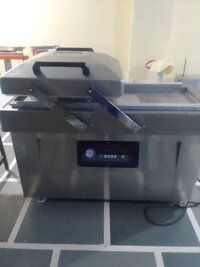 Double chamber vacuum sealer machine