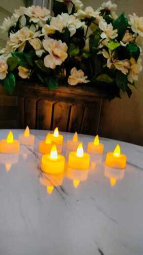 Pack of 24 T-light Candle - Diameter: 1.5 inches / Height: 1 inch, Warm White Color, 7 to 8 Hours Burning Time, Ideal for Bars, Birthdays, Home Decoration, Parties