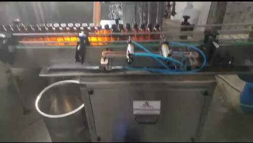 4 Head Bottle Filling Machine - Automatic Grade: Manual