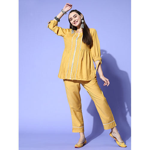 A Mustard Self Weave Rayon Co-Ords Set With A Round Neck Laced Top And A Solid Mustard Self Weave Rayon Pant