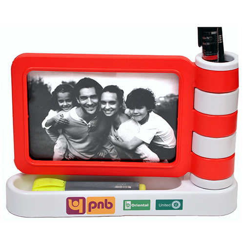 Desktop With Moving Photoframe And Pen Holder