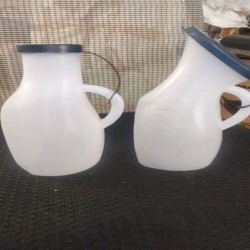 White Male And Female Urine Pots