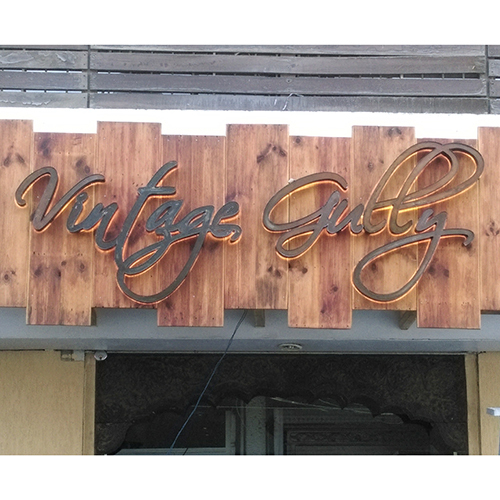 Metallic And Wooden Signage Board