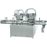 Automatic Eight Head Volumetric Liquid Filling Machine - Capacity: 42 Pcs/min
