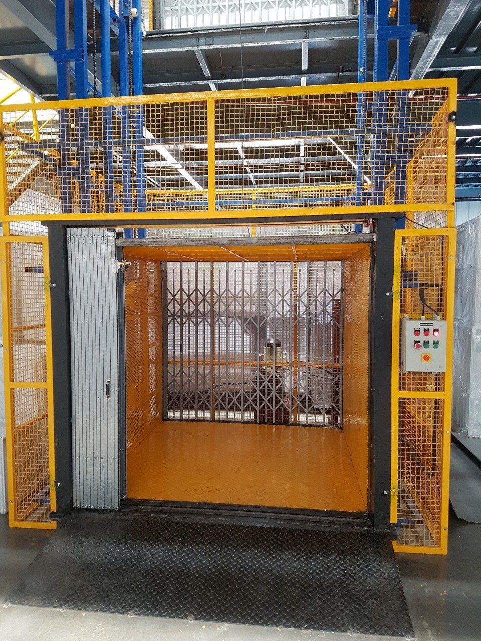 Goods Lift with wire mesh enclosure