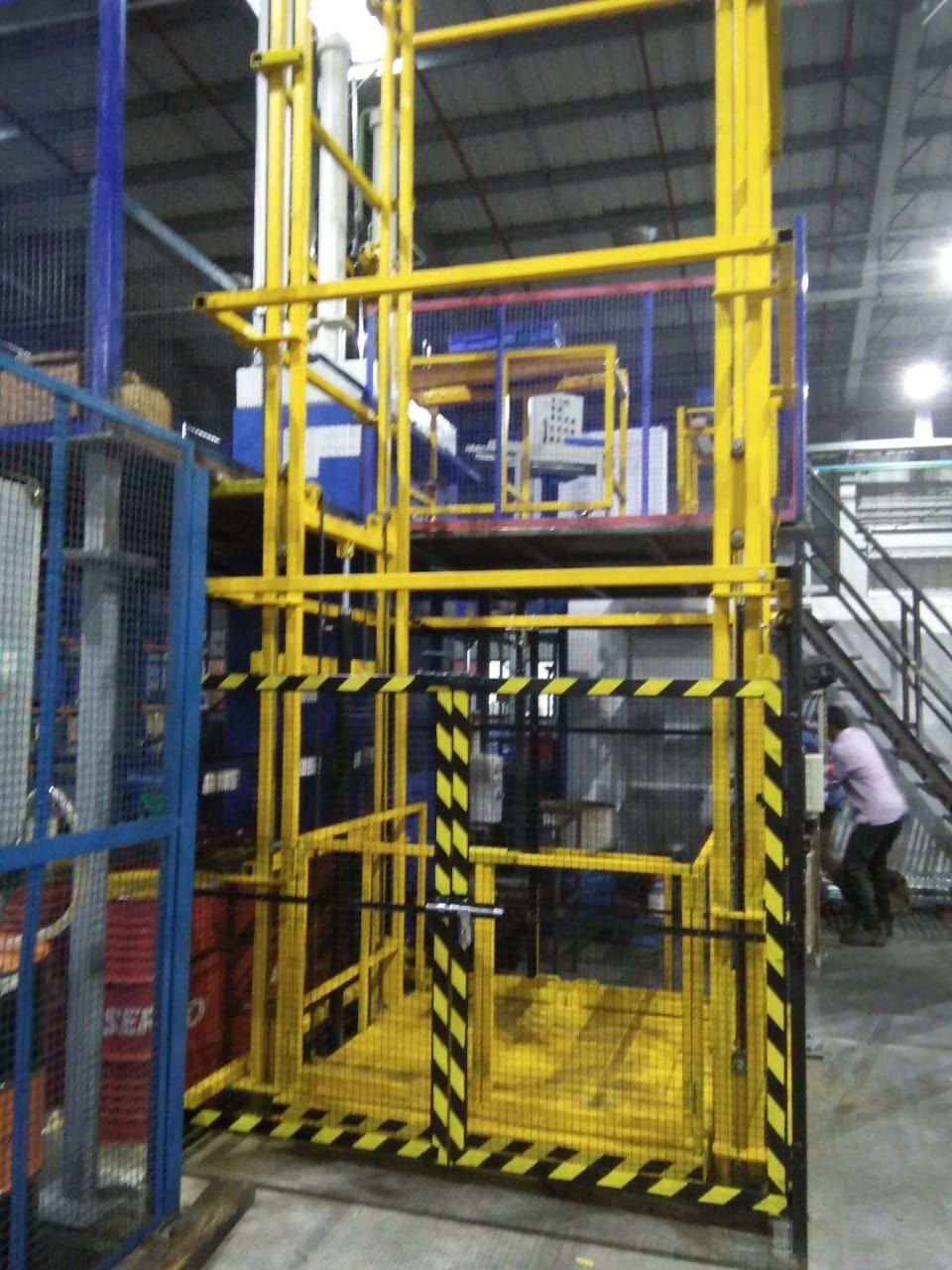 Goods Lift with wire mesh enclosure