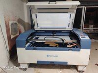 Automatic CO2 Laser Cutting Machine