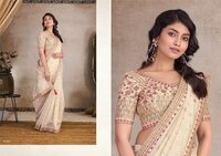 Organza self jacquard with butti jacquard.
