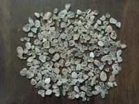 Crushed clear glass chips transparent made of recycled glass for fire pits and garden decorations