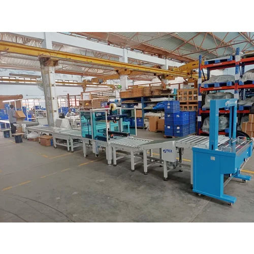 Box Sealing And Strapping Machine