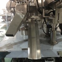 AUTO TUBE FILLING AND SEALING MACHINE