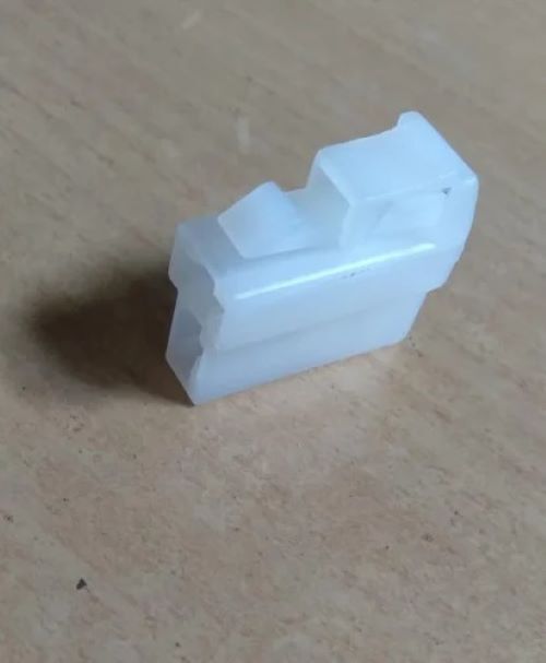 CONNECTOR AND TERMINAL