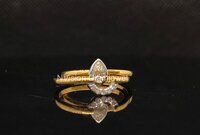 Half-Halo Pear Solitaire Twin Diamond Rings