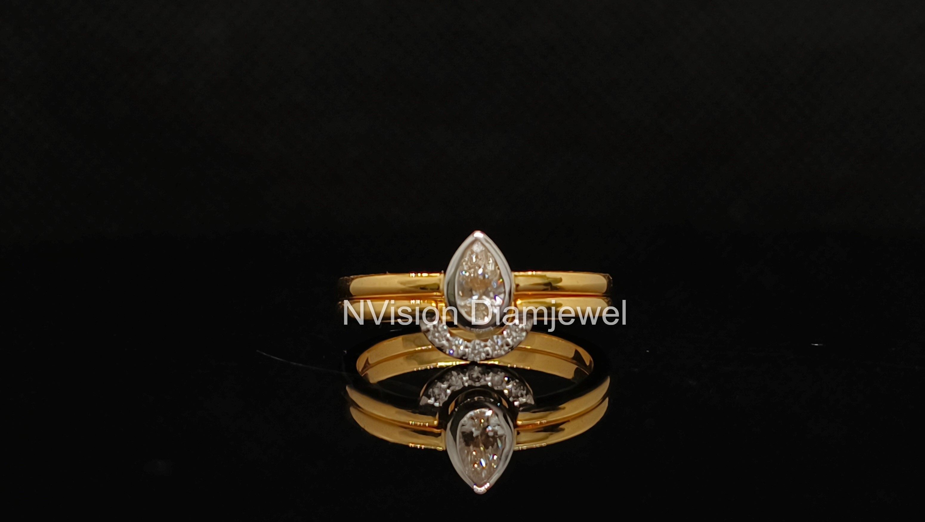 Half-Halo Pear Solitaire Twin Diamond Rings