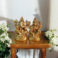 Aakrati Lakshmi And Ganesha Pair In Yellow Finish Decorative Showpiece - 8 Cm  (brass, Yellow) - Color: Brown