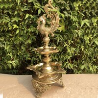 Aakrati Brass Decorative Showpiece Oil Lamp with Peacock - Table Diya Stand - Indian Religious Metal Craft for Gift and Dcor